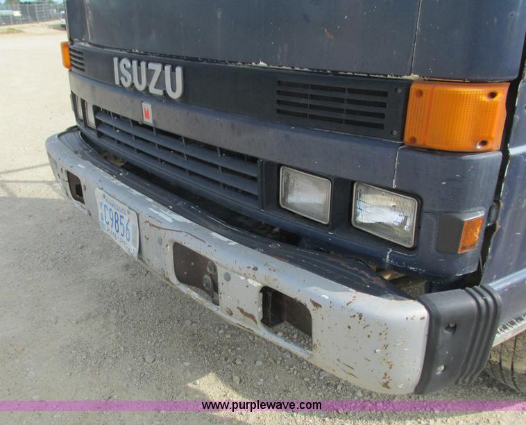 image for item K4057 1990 Isuzu NPR flatbed truck