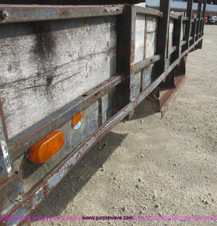 image for item K4057 1990 Isuzu NPR flatbed truck