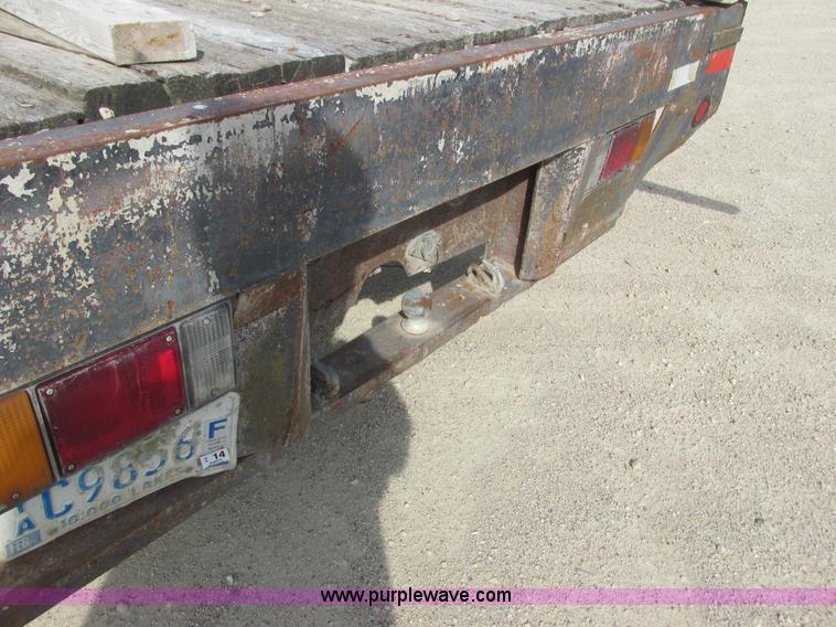 image for item K4057 1990 Isuzu NPR flatbed truck