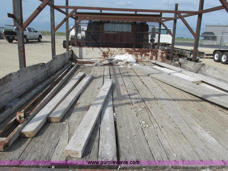 image for item K4057 1990 Isuzu NPR flatbed truck