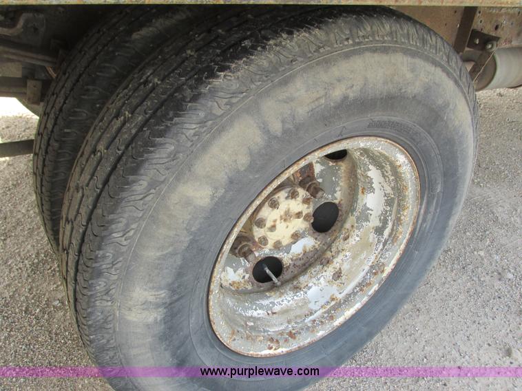 image for item K4057 1990 Isuzu NPR flatbed truck