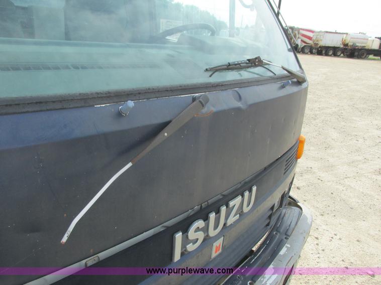 image for item K4057 1990 Isuzu NPR flatbed truck