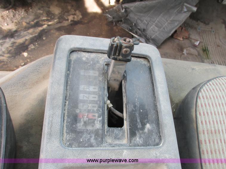 image for item K4057 1990 Isuzu NPR flatbed truck