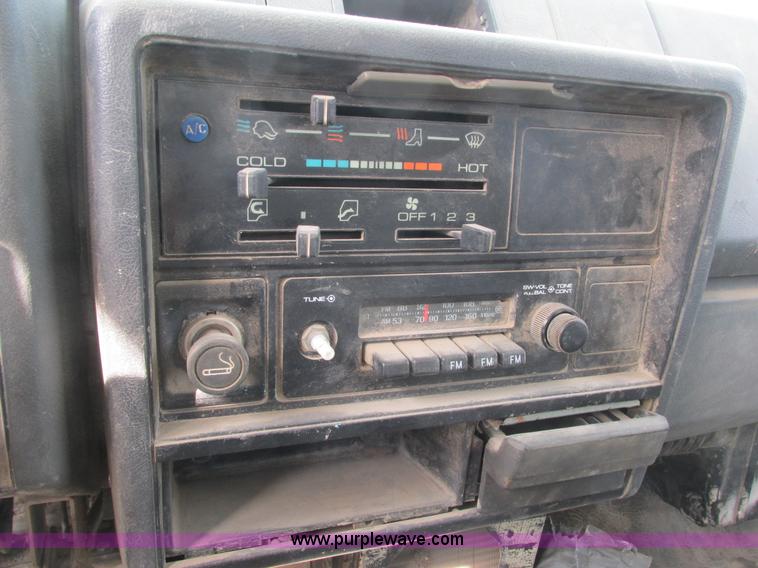 image for item K4057 1990 Isuzu NPR flatbed truck