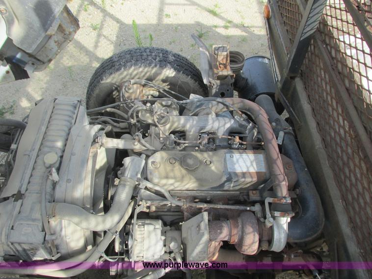 image for item K4057 1990 Isuzu NPR flatbed truck