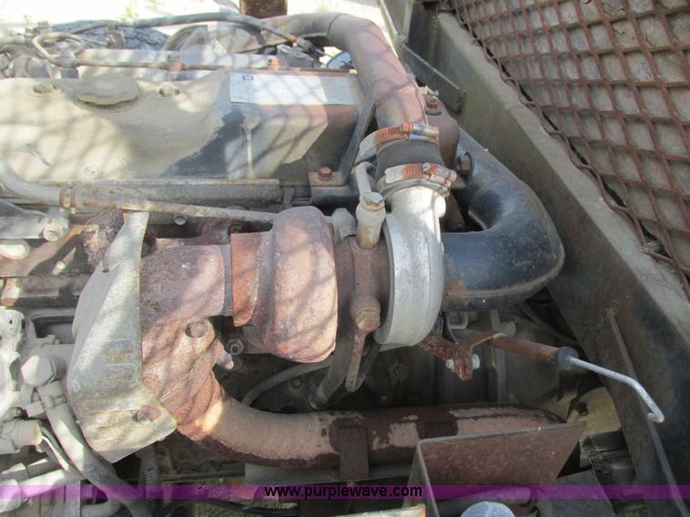 image for item K4057 1990 Isuzu NPR flatbed truck