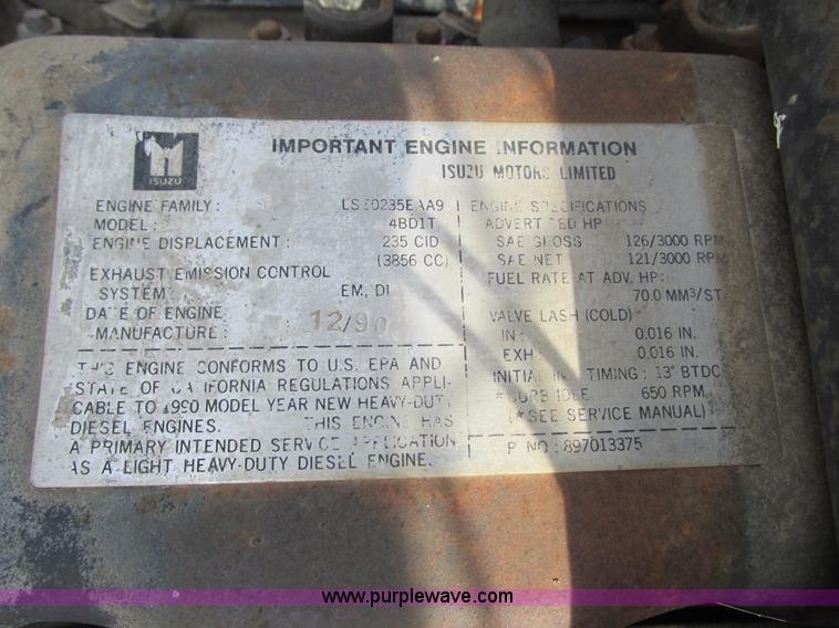 image for item K4057 1990 Isuzu NPR flatbed truck