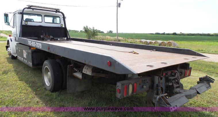 image for item K5304 2000 Freightliner FL60 rollback truck