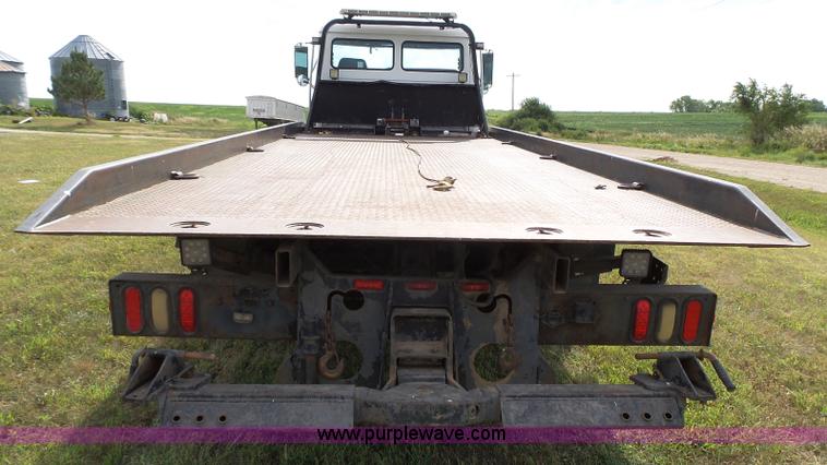 image for item K5304 2000 Freightliner FL60 rollback truck