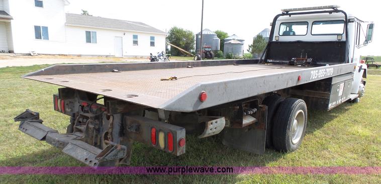 image for item K5304 2000 Freightliner FL60 rollback truck