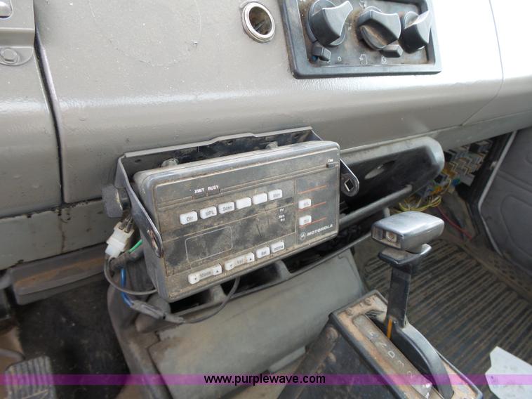 image for item K5304 2000 Freightliner FL60 rollback truck