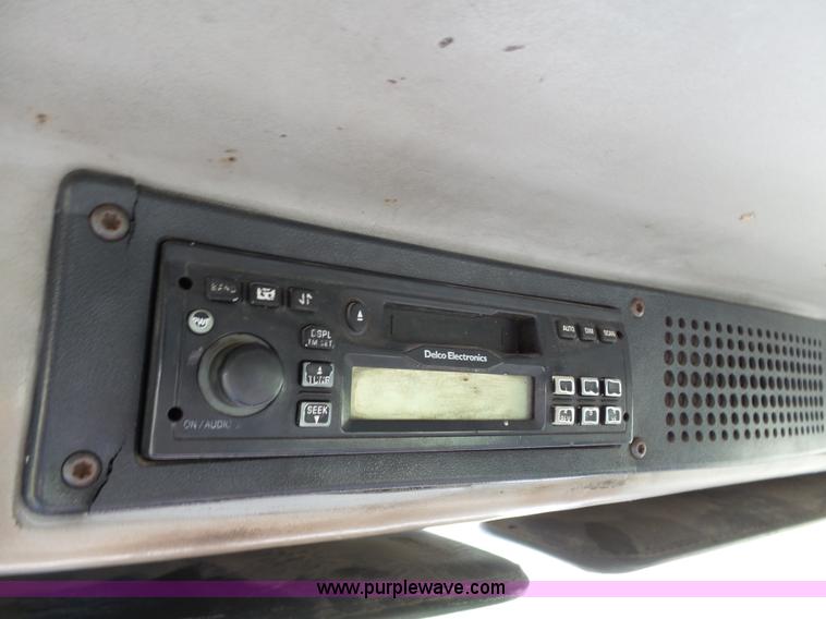 image for item K5304 2000 Freightliner FL60 rollback truck