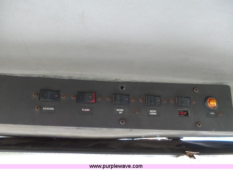 image for item K5304 2000 Freightliner FL60 rollback truck