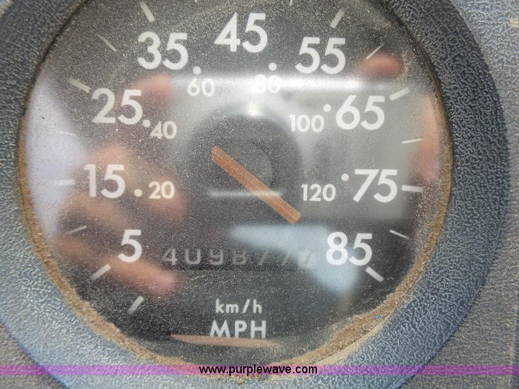 image for item K5304 2000 Freightliner FL60 rollback truck