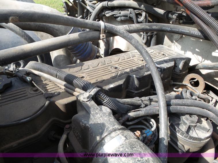 image for item K5304 2000 Freightliner FL60 rollback truck