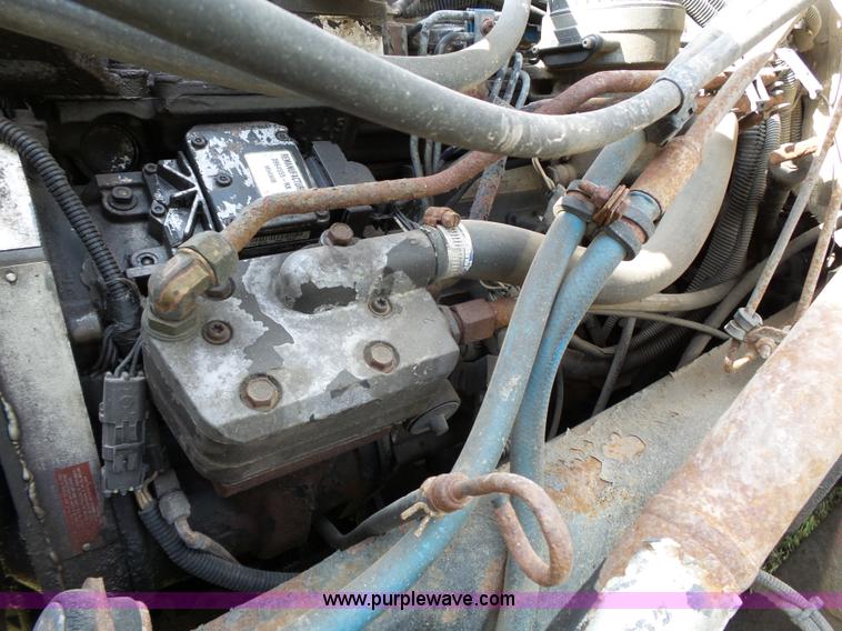 image for item K5304 2000 Freightliner FL60 rollback truck