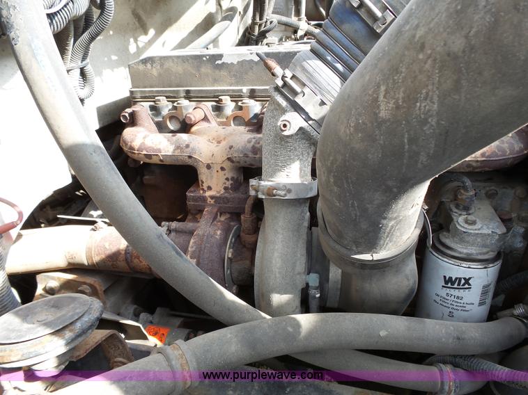 image for item K5304 2000 Freightliner FL60 rollback truck