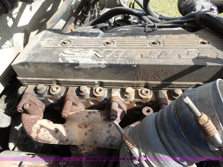 image for item K5304 2000 Freightliner FL60 rollback truck