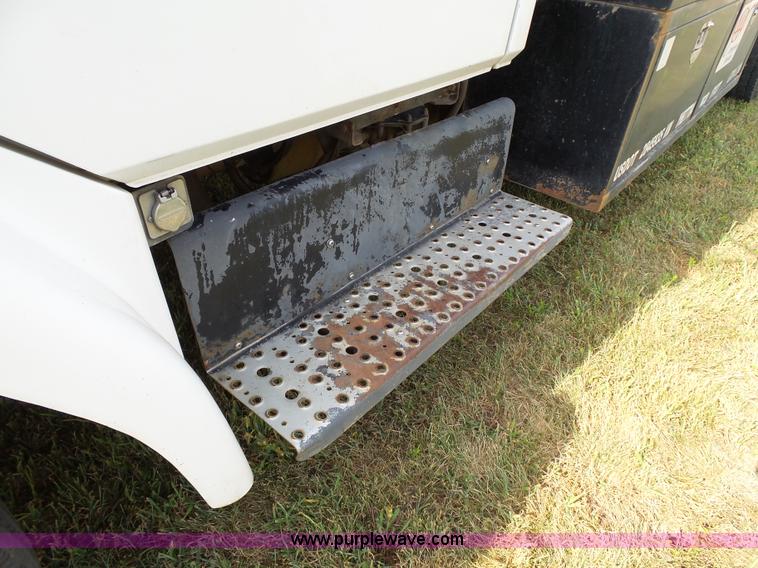 image for item K5304 2000 Freightliner FL60 rollback truck