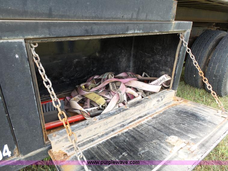 image for item K5304 2000 Freightliner FL60 rollback truck