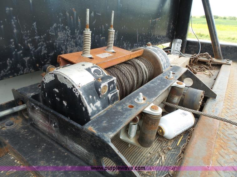 image for item K5304 2000 Freightliner FL60 rollback truck