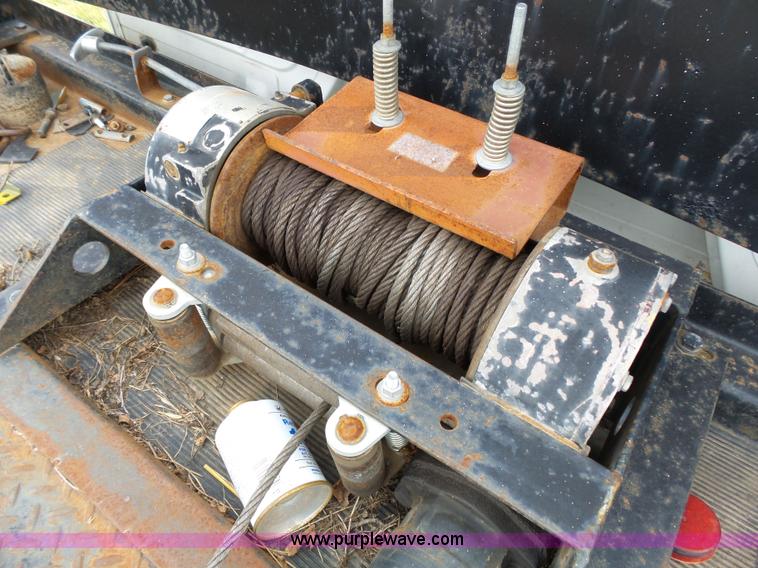 image for item K5304 2000 Freightliner FL60 rollback truck