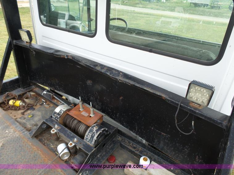 image for item K5304 2000 Freightliner FL60 rollback truck