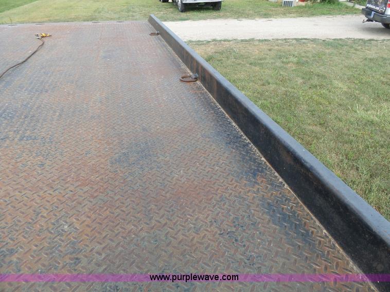 image for item K5304 2000 Freightliner FL60 rollback truck