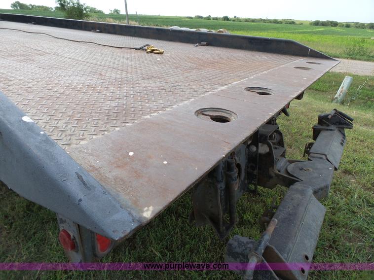 image for item K5304 2000 Freightliner FL60 rollback truck