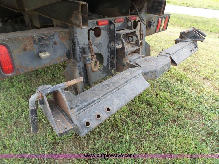 image for item K5304 2000 Freightliner FL60 rollback truck