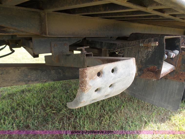 image for item K5304 2000 Freightliner FL60 rollback truck