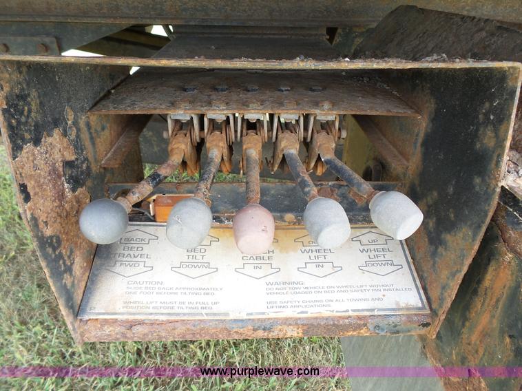 image for item K5304 2000 Freightliner FL60 rollback truck