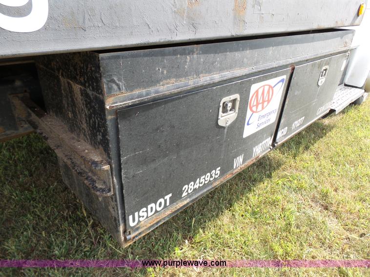 image for item K5304 2000 Freightliner FL60 rollback truck