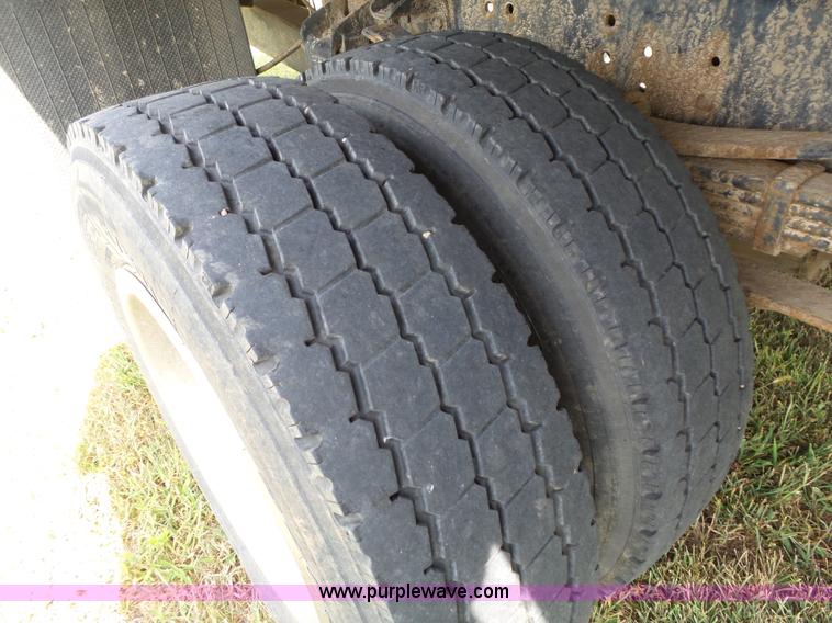 image for item K5304 2000 Freightliner FL60 rollback truck