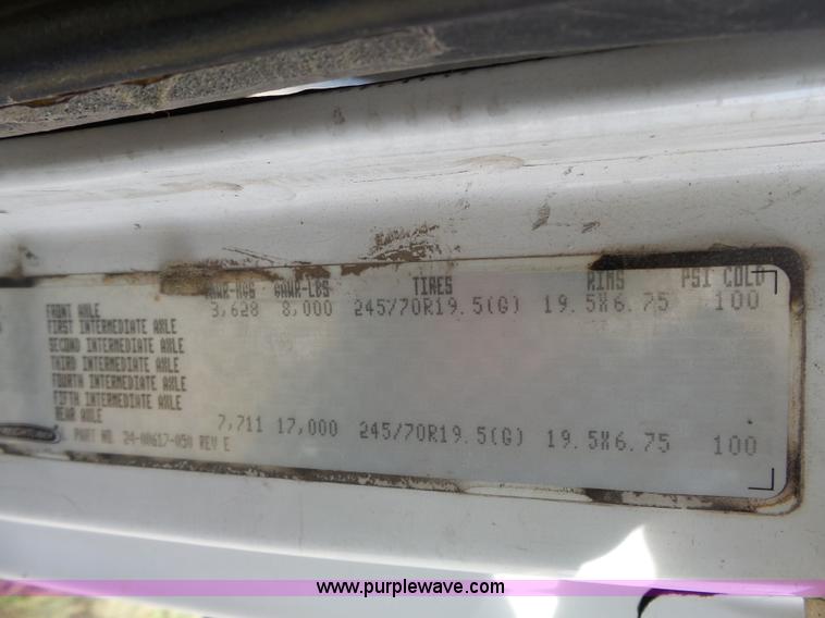 image for item K5304 2000 Freightliner FL60 rollback truck