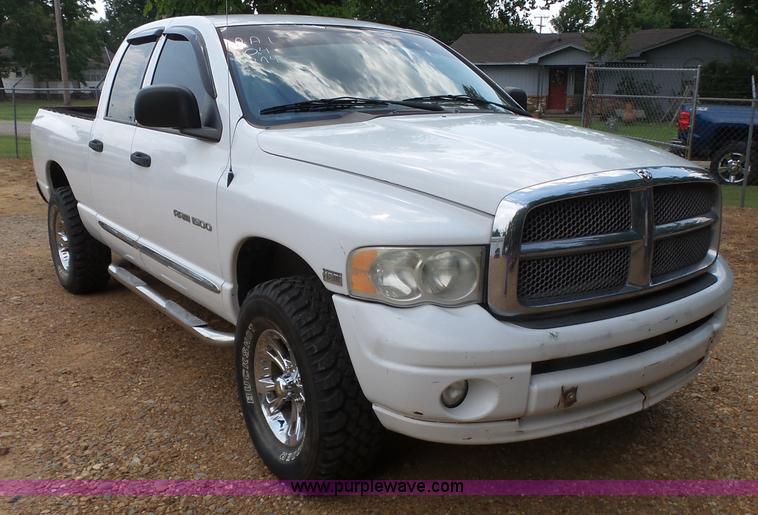 image for item K7059 2004 Dodge Ram 1500 Quad Cab pickup truck