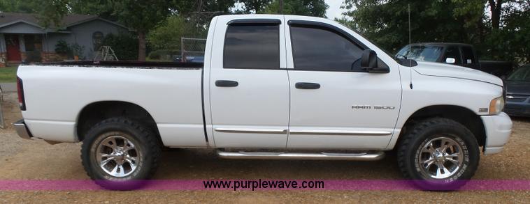 image for item K7059 2004 Dodge Ram 1500 Quad Cab pickup truck