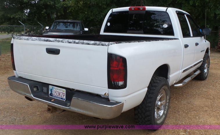 image for item K7059 2004 Dodge Ram 1500 Quad Cab pickup truck
