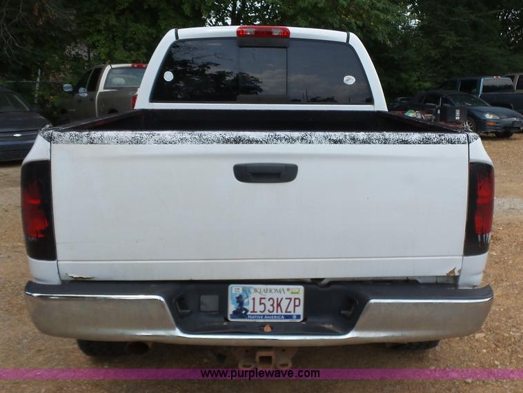 image for item K7059 2004 Dodge Ram 1500 Quad Cab pickup truck