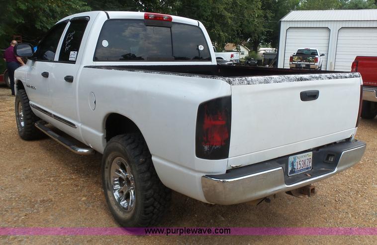 image for item K7059 2004 Dodge Ram 1500 Quad Cab pickup truck