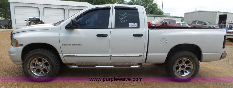 image for item K7059 2004 Dodge Ram 1500 Quad Cab pickup truck