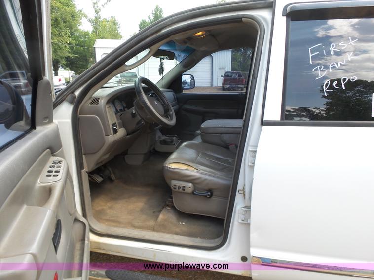 image for item K7059 2004 Dodge Ram 1500 Quad Cab pickup truck