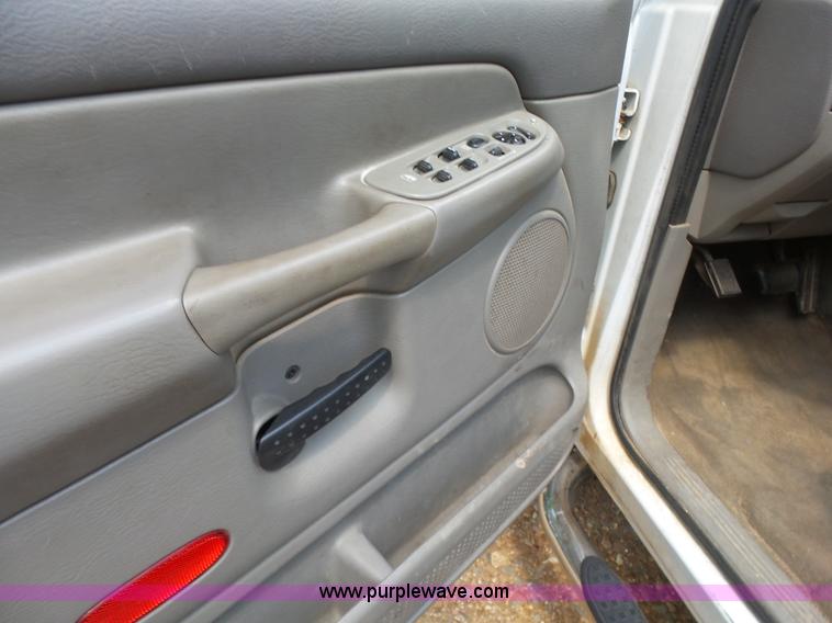 image for item K7059 2004 Dodge Ram 1500 Quad Cab pickup truck