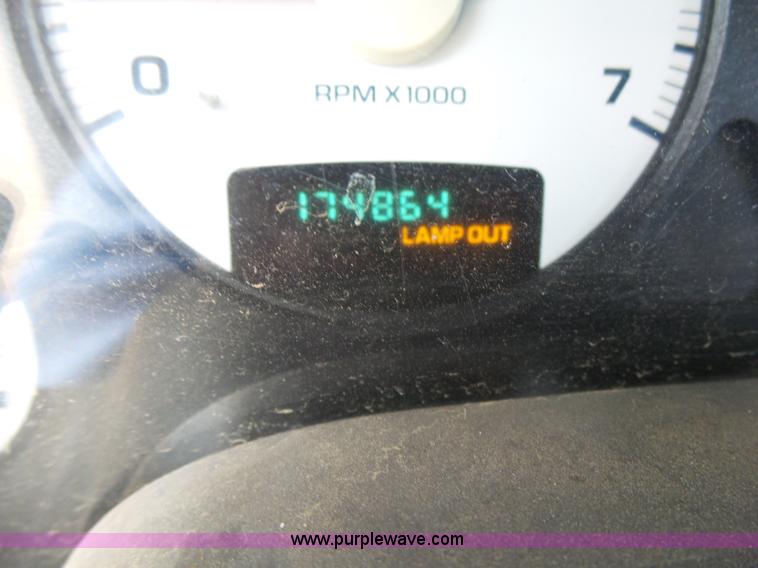 image for item K7059 2004 Dodge Ram 1500 Quad Cab pickup truck