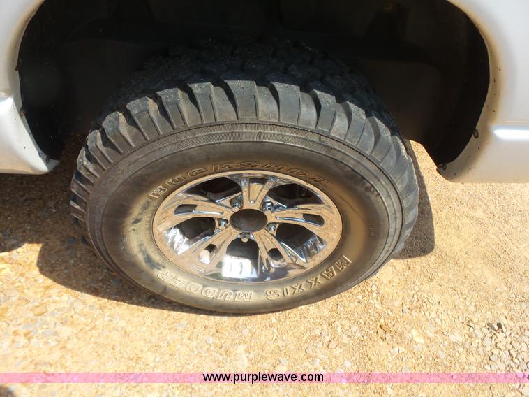 image for item K7059 2004 Dodge Ram 1500 Quad Cab pickup truck