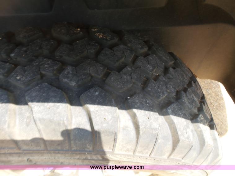 image for item K7059 2004 Dodge Ram 1500 Quad Cab pickup truck