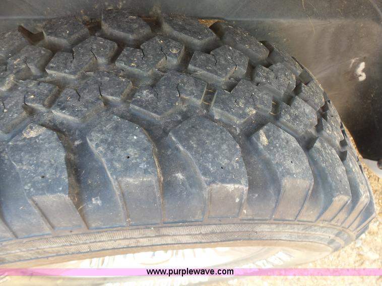 image for item K7059 2004 Dodge Ram 1500 Quad Cab pickup truck