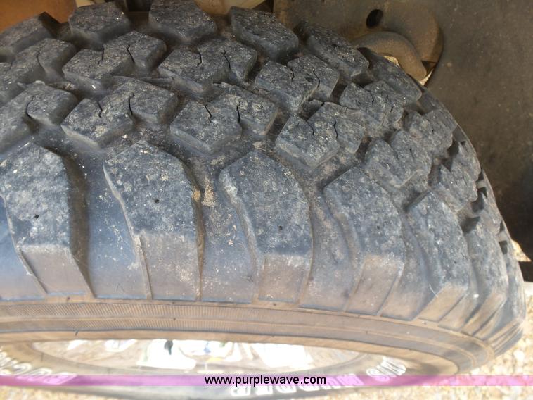 image for item K7059 2004 Dodge Ram 1500 Quad Cab pickup truck