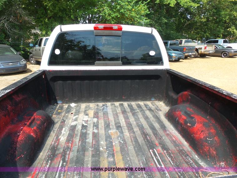 image for item K7059 2004 Dodge Ram 1500 Quad Cab pickup truck