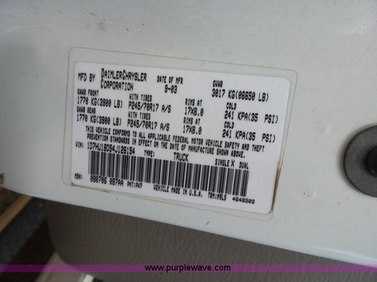 image for item K7059 2004 Dodge Ram 1500 Quad Cab pickup truck